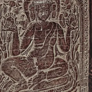 Stone Buddha half-relief with three faces in Nanapaya Temple Stone Buddha half-relief with three faces in Nanapaya Temple