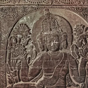 Stone Buddha half-relief with three faces in Nanapaya Temple Stone Buddha half-relief with three faces in Nanapaya Temple