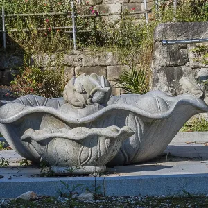 Stone carved lotus flower water basin at Buddhist temple in Korea in Gimje-si Stone carved lotus flower water basin at Buddhist temple in Korea in Gimje-si
