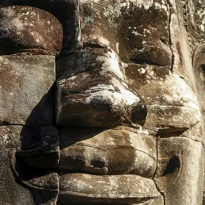 Stone Face sculpture in Bayon temple in the Angkor Wat complex near Siem Reap in Cambodia Stone Face sculpture in Bayon temple in the Angkor Wat complex near Siem Reap in Cambodia