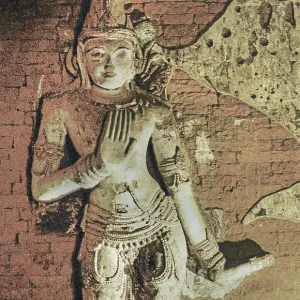 Stone relief of a dancer in the Naga Yon Hpaya Temple Stone relief of a dancer in the Naga Yon Hpaya Temple