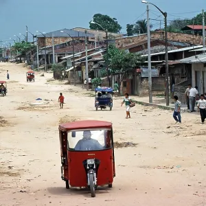 Street, houses, people, tuk-tuks Street, houses, people, tuk-tuks