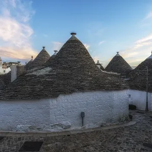 Empty streets of Trulli houses in Alberobello in the morning