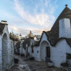 Empty streets of Trulli houses in Alberobello in the morning