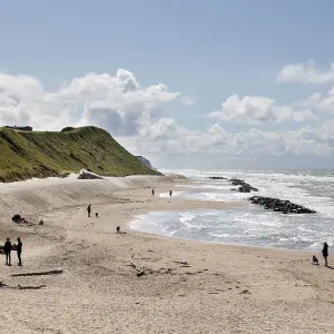 Strollers on the beach of Lonstrup