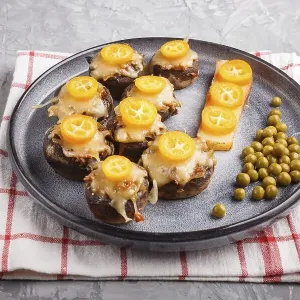 Stuffed fried champignons with cheese Stuffed fried champignons with cheese