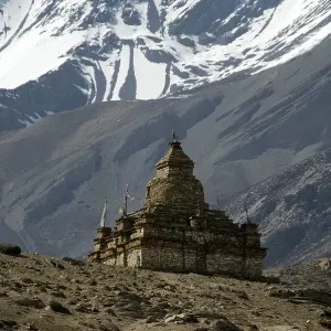 Stupa with snow-covered mountain slopes in the background Nar Nar-Phu Annapurna Region Nepal Stupa with snow-covered mountain slopes in the background Nar Nar-Phu Annapurna Region Nepal