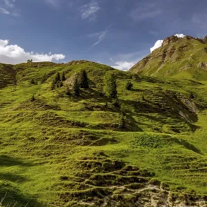 Summer evening Dolomite mountain peak in Passo di Rolle