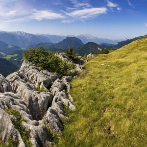 At the summit of Alpbichl with a view of the Lammertal and Tennengebirge mountains