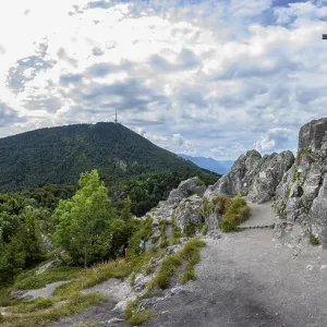 Summit cross on the Nockstein with a view of the Gaisberg