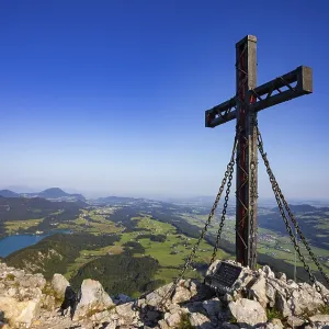 Summit cross on the Schober with a view of Lake Fuschl