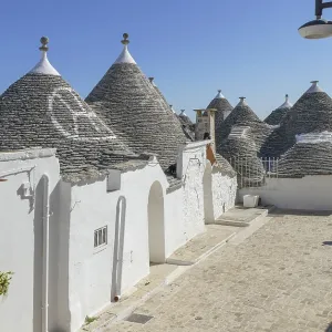 Sunny impression of trulli houses at a town named Alberobello in Apulia Sunny impression of trulli houses at a town named Alberobello in Apulia