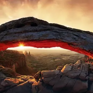 Sunrise at Mesa Arch stone arch Sunrise at Mesa Arch stone arch