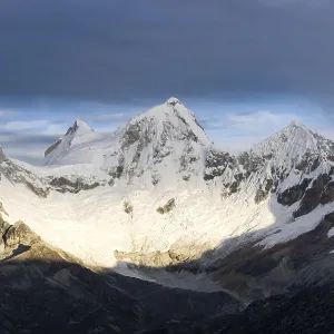 sunrise over the four peaks of Nevado Huandoy in the Andes of Peru in the central Cordillera Blanca
