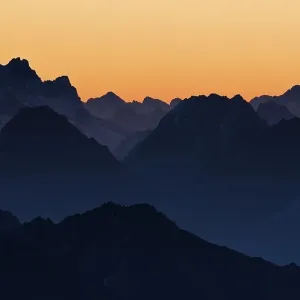 Sunrise with rows of mountains Sunrise with rows of mountains