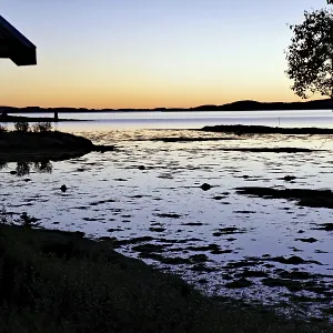 Sunset at a campsite, quiet fjord