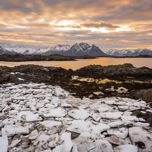 Sunset on the coast of Laukvik in winter Sunset on the coast of Laukvik in winter