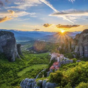 Sunset over monastery of Rousanou and Monastery of St