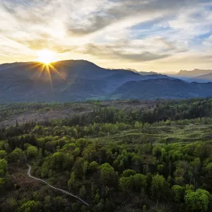 Sunset over Mountains and Coniston Water from drone Sunset over Mountains and Coniston Water from drone