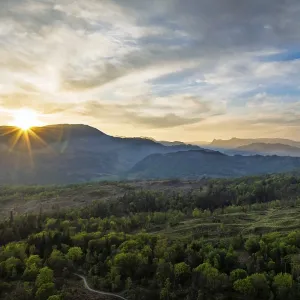 Sunset over Mountains and Coniston Water from drone Sunset over Mountains and Coniston Water from drone