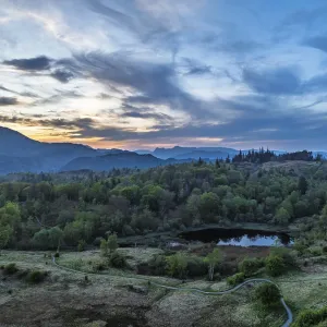 Sunset over Mountains and Coniston Water from drone Sunset over Mountains and Coniston Water from drone