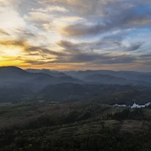 Sunset over Mountains and Coniston Water from drone Sunset over Mountains and Coniston Water from drone