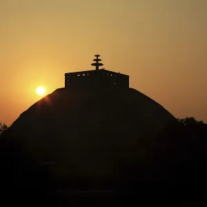 Sunset against Stupa 1 constructed by king Ashoka Sunset against Stupa 1 constructed by king Ashoka