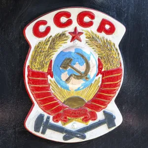 Symbol of former state the USSR on the retro steam locomotive