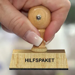Symbolic photo, woman's hand with stamp