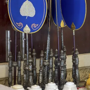 Several talipot fans with symbolic painting at Buddhist temple Asokaram