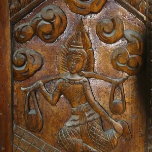 Temple door decorated with wood carvings in Buddhist monastery complex Buddhist temple complex Wat Sri Sunthon Temple door decorated with wood carvings in Buddhist monastery complex Buddhist temple complex Wat Sri Sunthon