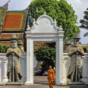 Temple guardians, sculptures, monk in the gate Temple guardians, sculptures, monk in the gate