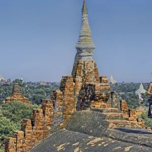 Temple top with tourist and view of many temples Temple top with tourist and view of many temples