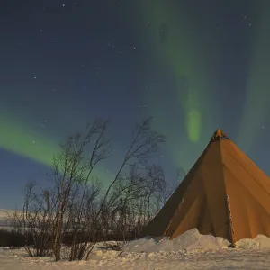 Tent in wintry landscape, Northern Lights Tent in wintry landscape, Northern Lights