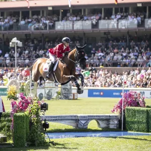Tiffany Foster of Canada and riding Figor compete in the first round of the 1 Tiffany Foster of Canada and riding Figor compete in the first round of the 1