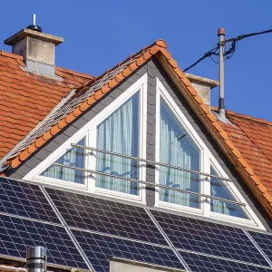 Tiled roof with dormer and photovoltaic system