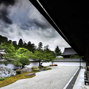 Tora Yaku no Niwa Zen Garden with carefully arranged rocks and sand patterns surrounded by nature Tora Yaku no Niwa Zen Garden with carefully arranged rocks and sand patterns surrounded by nature