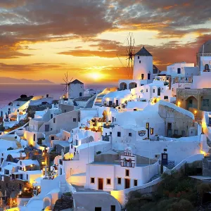 Townscape with windmills at sunset Townscape with windmills at sunset