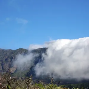 Trade wind clouds roll over the mountains of the Cumbre Vieja Trade wind clouds roll over the mountains of the Cumbre Vieja