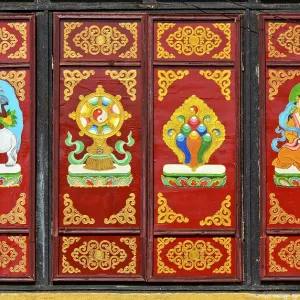 Traditional Buddhist motifs on wall
