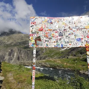 With transfer pictures pasted place-name sign at the Trollstigen