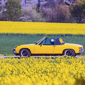 Travelling on a country road in the Swabian Alb with a VW Porsche 914 Youngtimer convertible