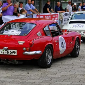 Triumph GT6 MK2, red classic car at a rally