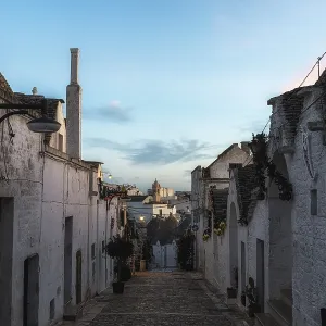 Trulli houses of Alberobello street in the morning