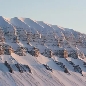 Typically shaped mountain in a wintry Spitsbergen Typically shaped mountain in a wintry Spitsbergen