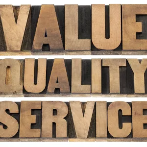 Value, quality, service- business mantra concept - isolated words in vintage letterpress wood type printing blocks Value, quality, service- business mantra concept - isolated words in vintage letterpress wood type printing blocks