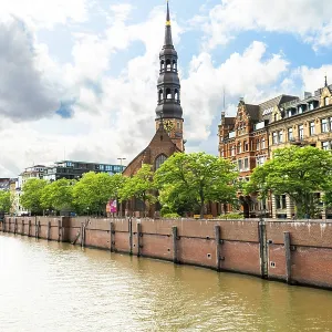 Vertical shot of skyline view of the hanseatic city of Hamburg on a cloudy day Vertical shot of skyline view of the hanseatic city of Hamburg on a cloudy day