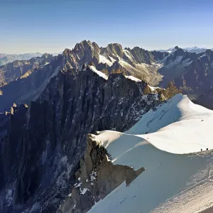 View from the Aiguille du Midi mountain station observation deck of the mountains Aiguille Vert