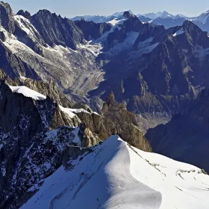 View from the Aiguille du Midi mountain station observation deck of the mountains Les Droites