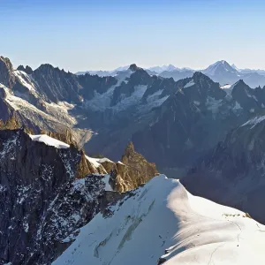 View from the Aiguille du Midi mountain station observation deck of the mountains Les Droites
